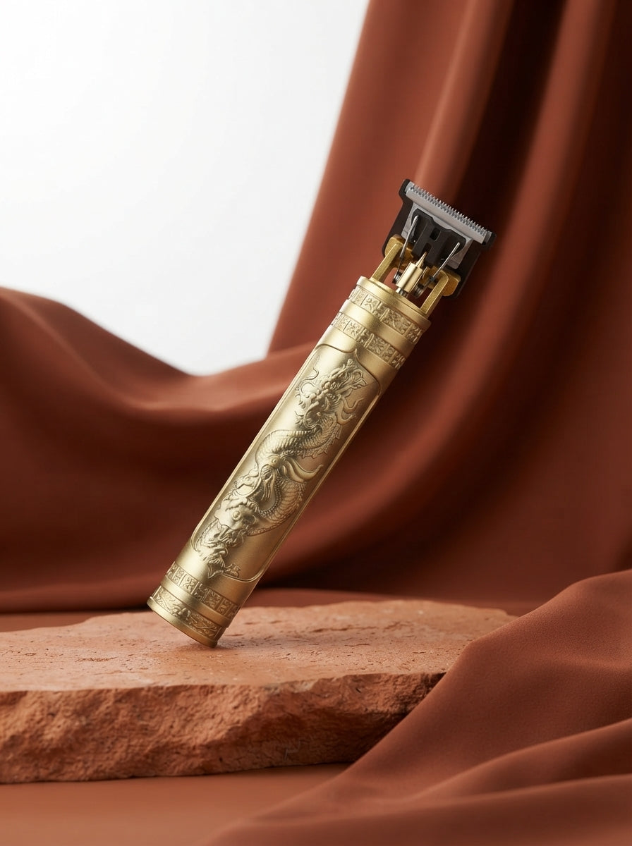 BarberVault Dragon T9 professional T-blade trimmer resting on a textured terracotta surface with burnt sienna accents.